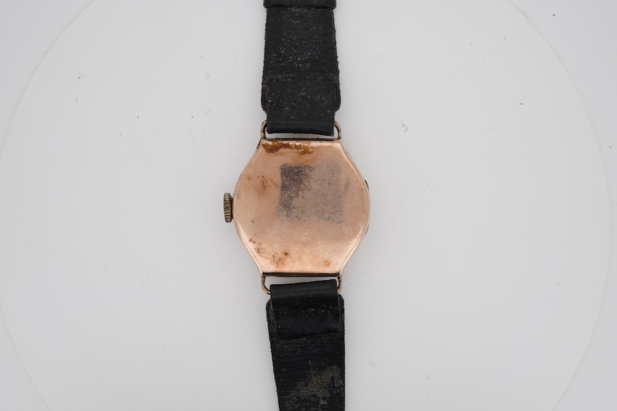 A gentleman's late 1920's 9ct gold Visible manual wind wrist watch, with Arabic dial and subsidiary seconds, case diameter 29mm, on a later associated leather strap.